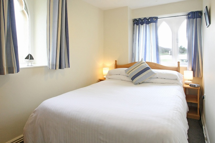Double Bedroom in a ground floor apartment in the Old Lifeboat House