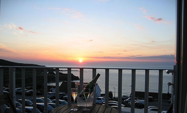 Sunset over Porthmeor Beach from the balcony of Surfs Up, 6 Ocean Breeze