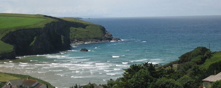 View of Mawgan Porth beach and Atlantic rollers from Thorncliff