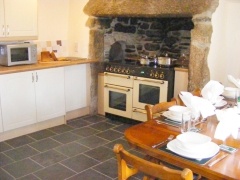 Millers kitchen with range and inglenook