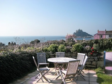 Enjoy alfresco dining in the garden with view of St Michaels Mount
