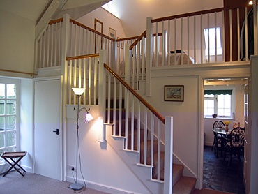 Tikkidew stairs to galleried bedroom
