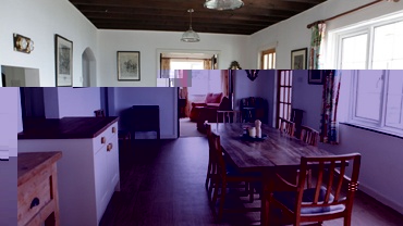 The dining room has a sizeable table to easily accommodate meals for large numbers