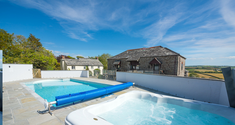 Heated outdoor swimming pool and hot tub