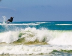 Kite surfing at Porth Beach