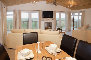 Lodge interior with open-plan living and dining area