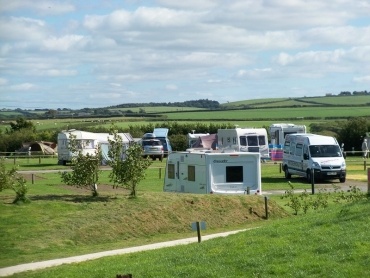 Touring caravans and motorhomes at Widemouth Fields