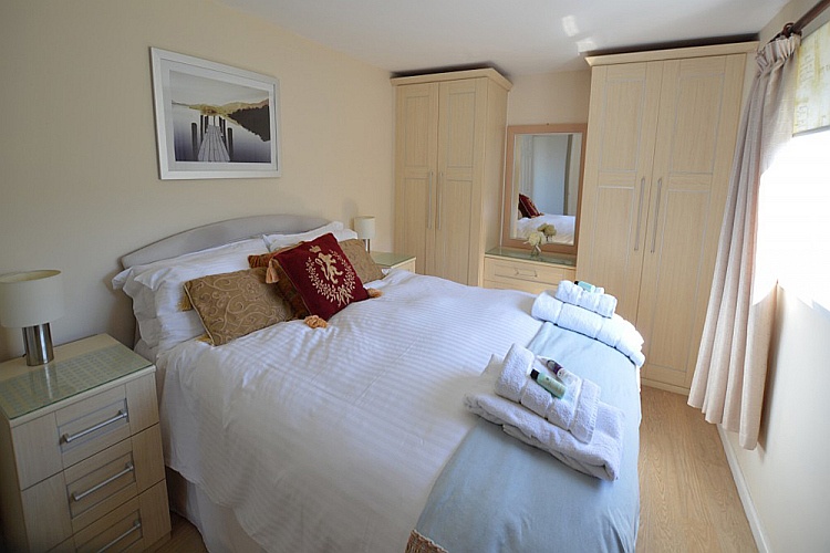 The spacious Master Bedroom with linen and hand towels included