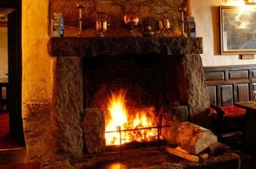 Welcoming Cornish granite fireplace